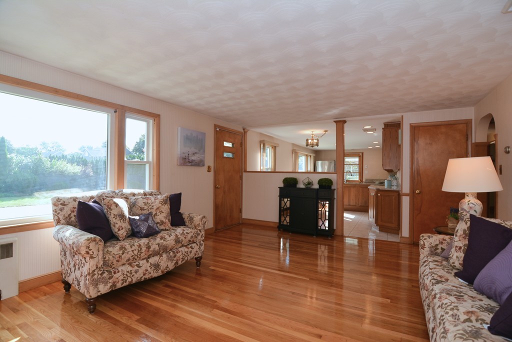 6 Cardinal Road Stoneham, MA 02180 - Photo 6 of 27 a living room with furniture and a large window