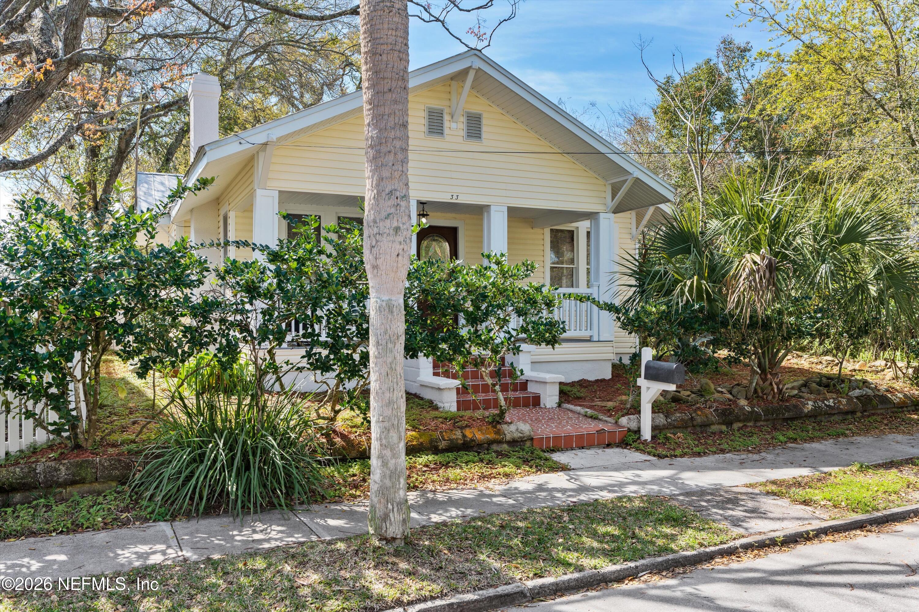 33 Cincinnati Avenue St. Augustine, FL 32084 - Photo 1 of 37 a front view of a house with a yard
