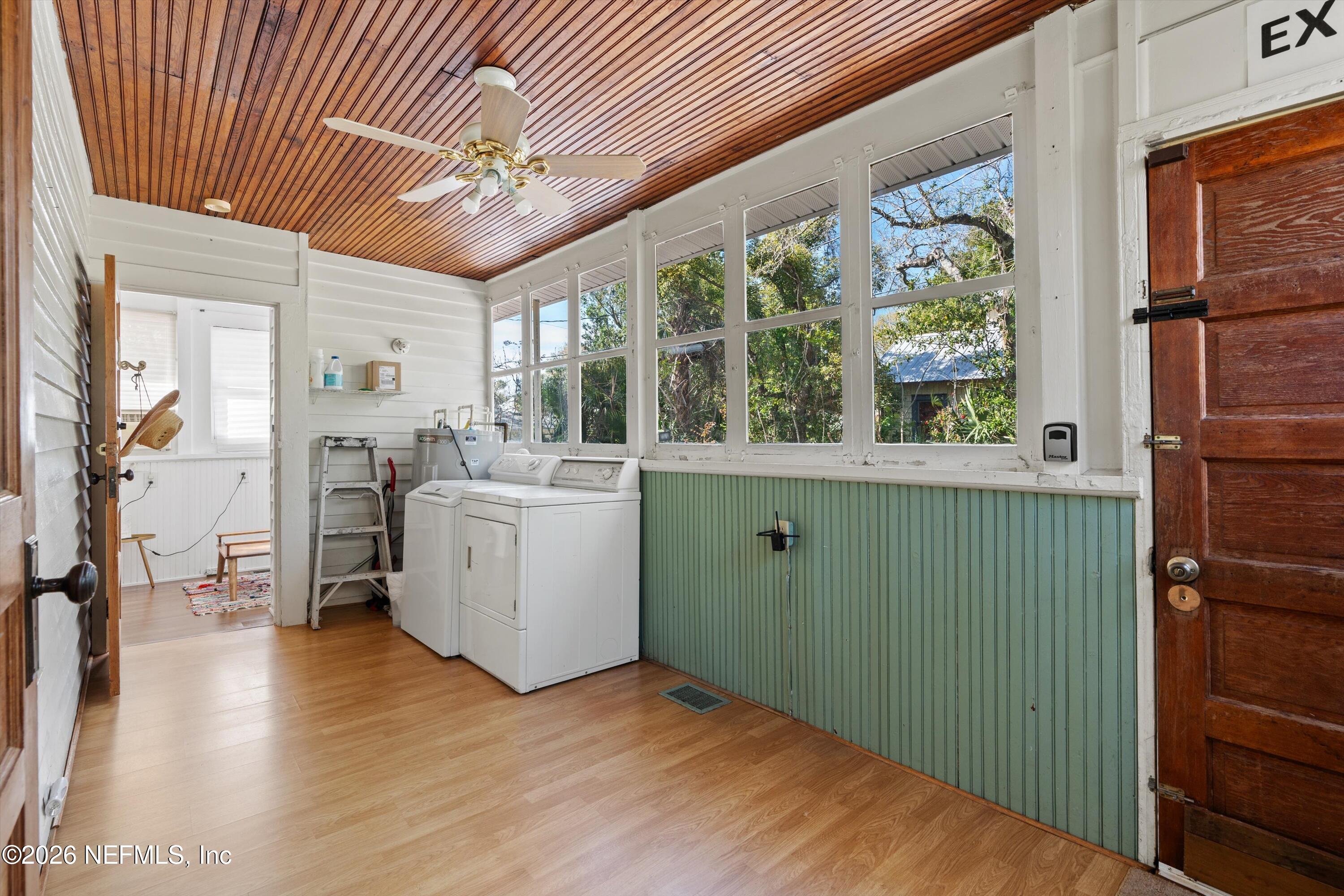 33 Cincinnati Avenue St. Augustine, FL 32084 - Photo 14 of 37 a room with a washer dryer and a large window