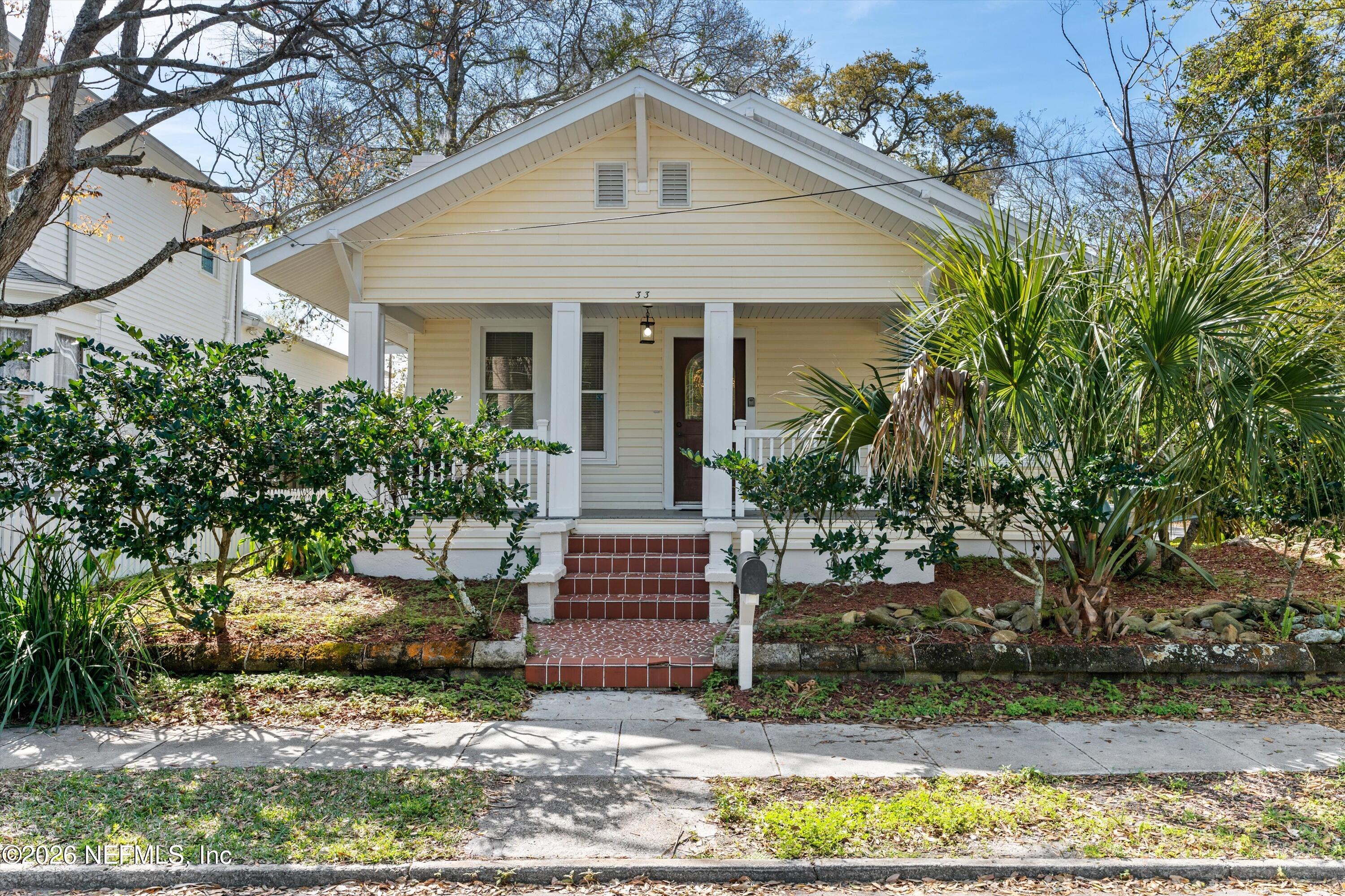 33 Cincinnati Avenue St. Augustine, FL 32084 - Photo 2 of 37 a front view of a house with a yard