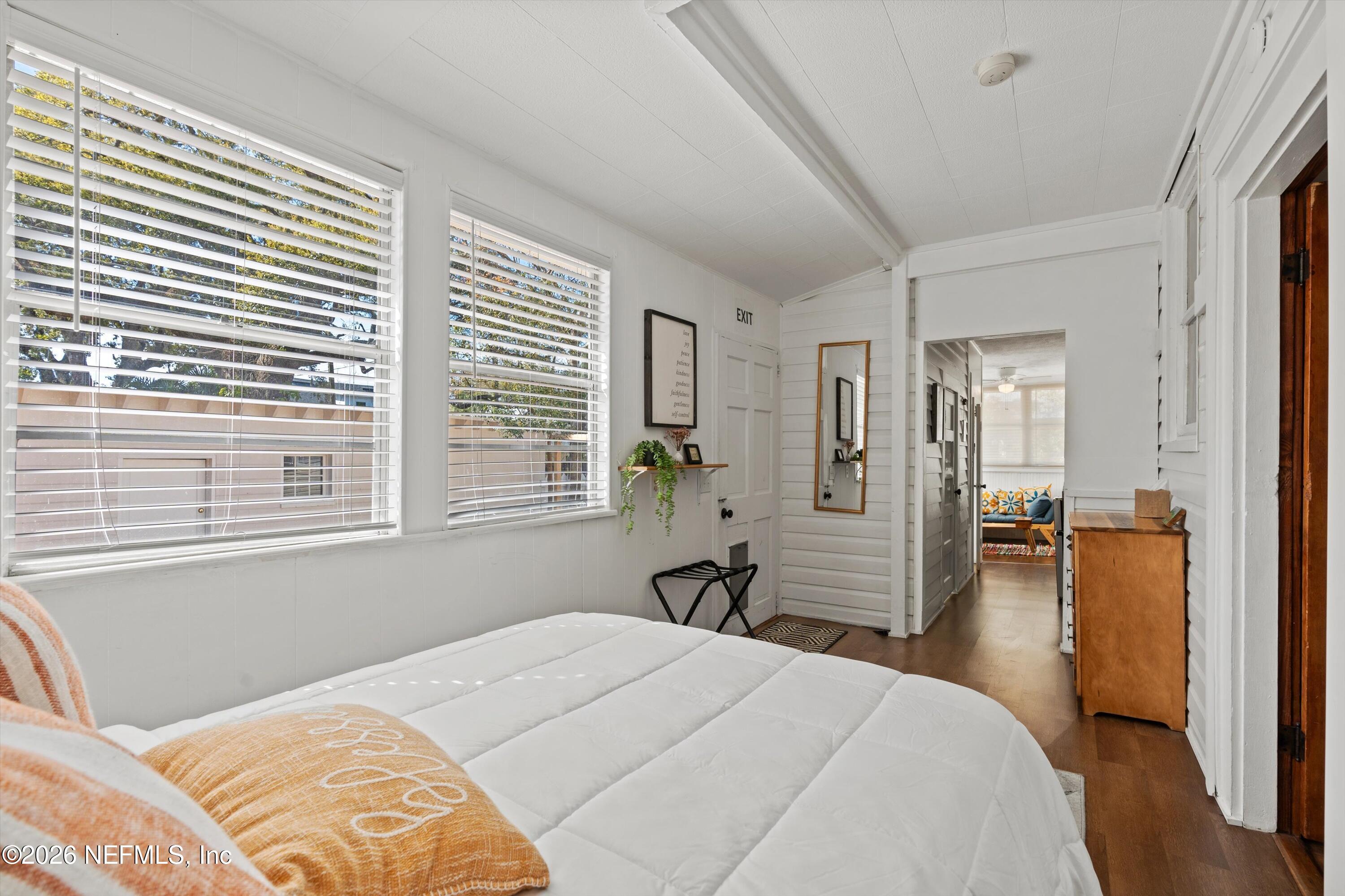 33 Cincinnati Avenue St. Augustine, FL 32084 - Photo 21 of 37 a bedroom with a bed and a large window