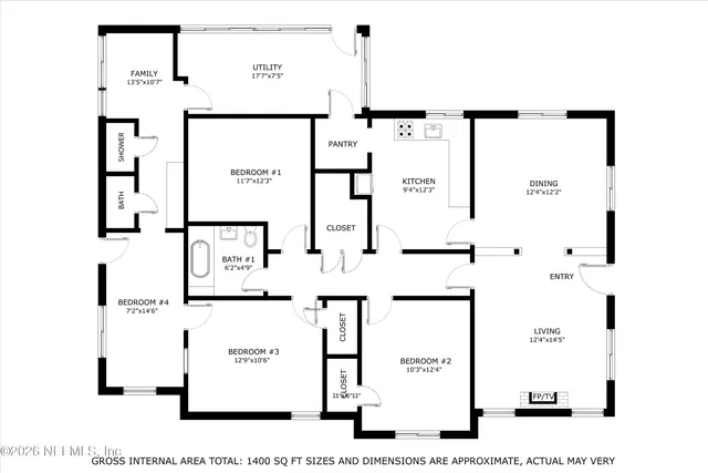 an aerial view of a house with a yard and lake view