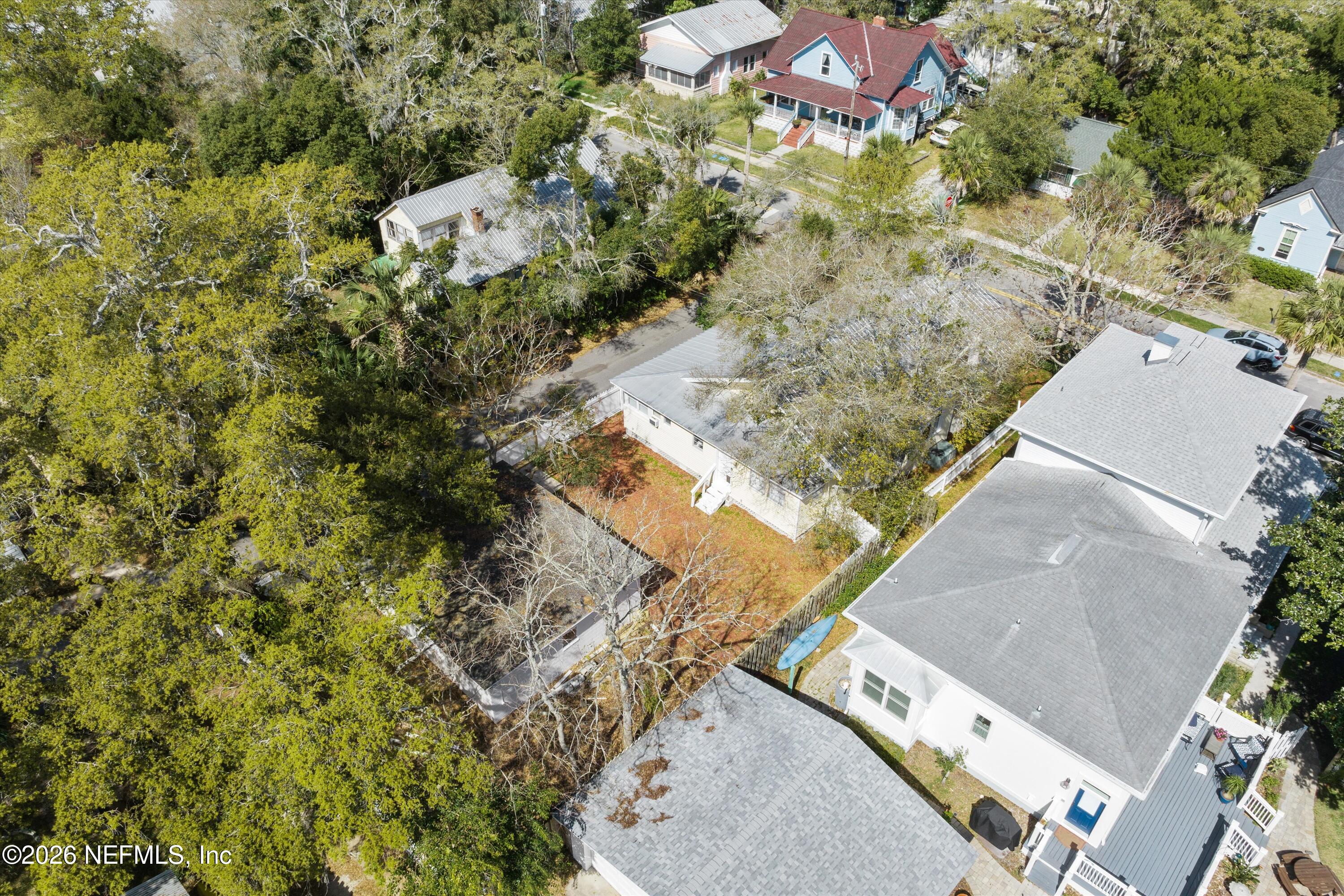 33 Cincinnati Avenue St. Augustine, FL 32084 - Photo 35 of 37 an aerial view of a house with a yard and lake view