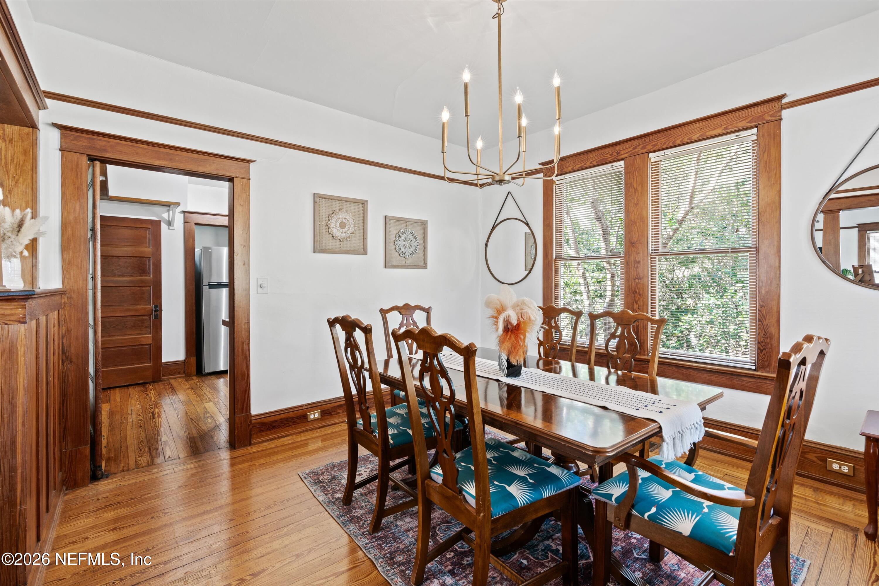 33 Cincinnati Avenue St. Augustine, FL 32084 - Photo 9 of 37 a view of a dining room with furniture window and wooden floor
