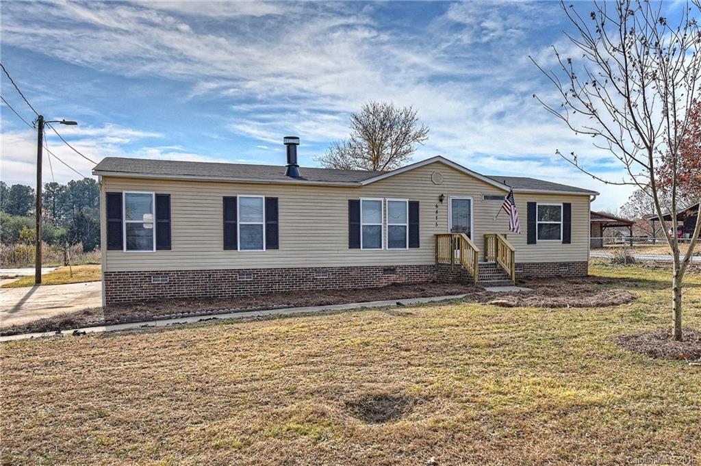 6815 Lackey Road, Unit 1 Vale, NC 28168 - Photo 2 of 24 a front view of a house with garden