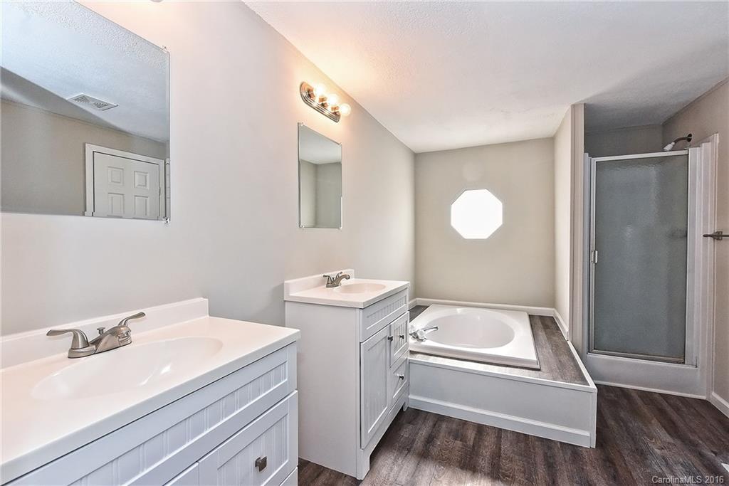 6815 Lackey Road, Unit 1 Vale, NC 28168 - Photo 13 of 24 a bathroom with a sink and a mirror