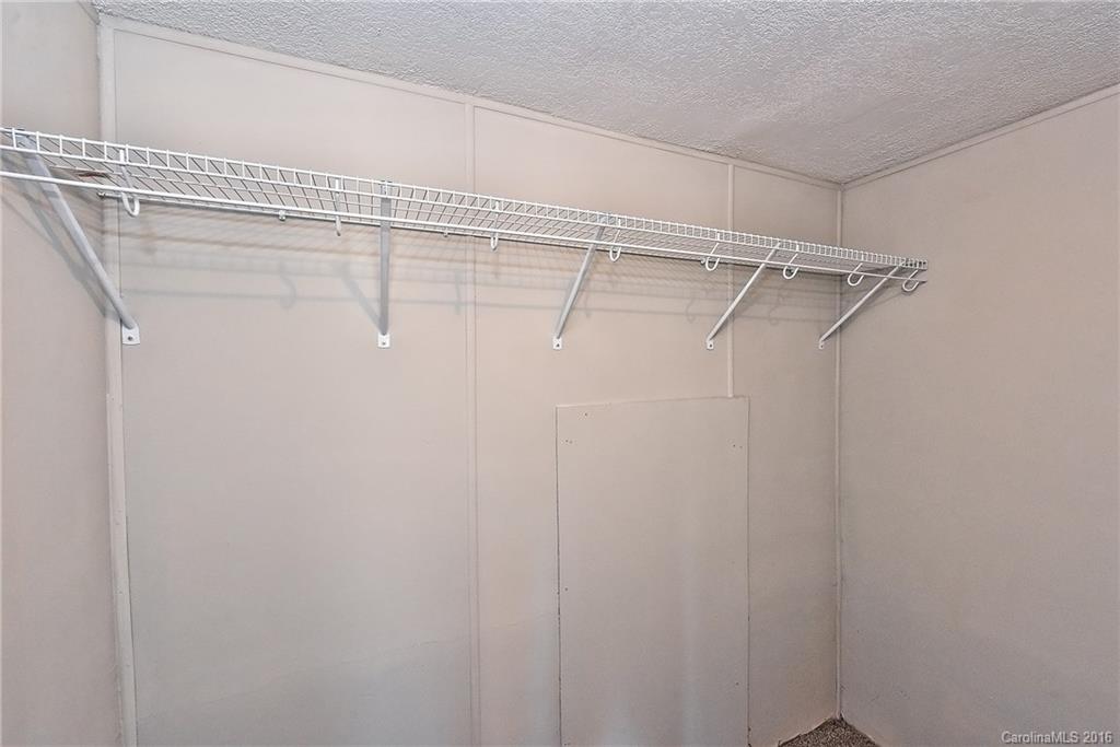 6815 Lackey Road, Unit 1 Vale, NC 28168 - Photo 17 of 24 a view of a room with racks on the wall
