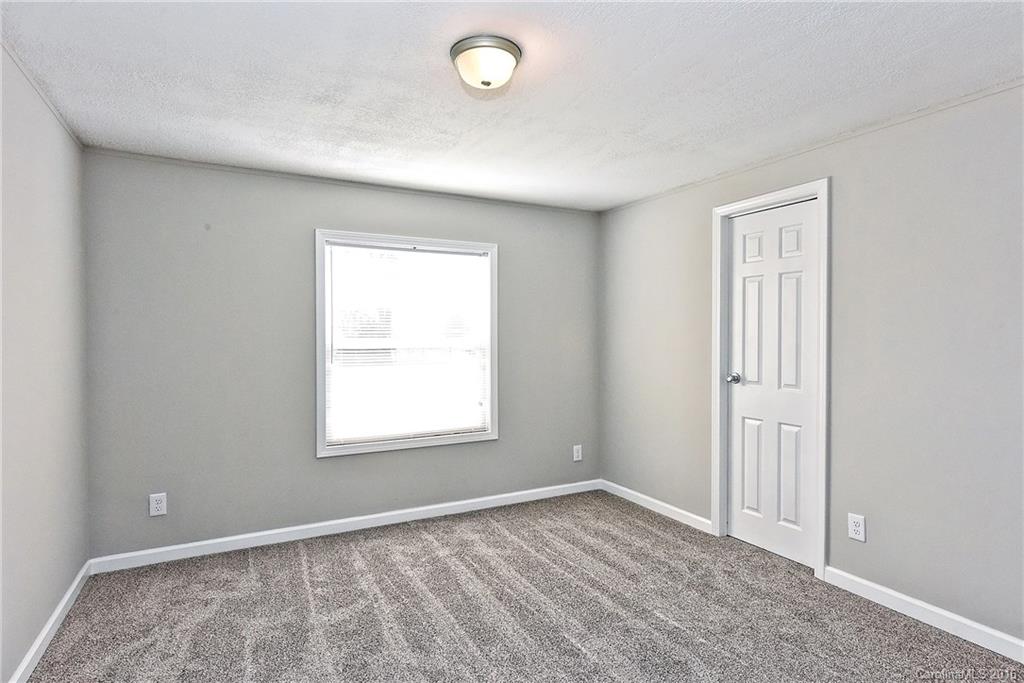 6815 Lackey Road, Unit 1 Vale, NC 28168 - Photo 18 of 24 an empty room with a window