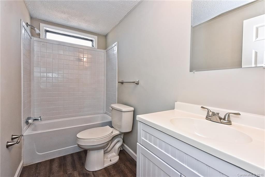 6815 Lackey Road, Unit 1 Vale, NC 28168 - Photo 20 of 24 a bathroom with a sink a toilet and shower