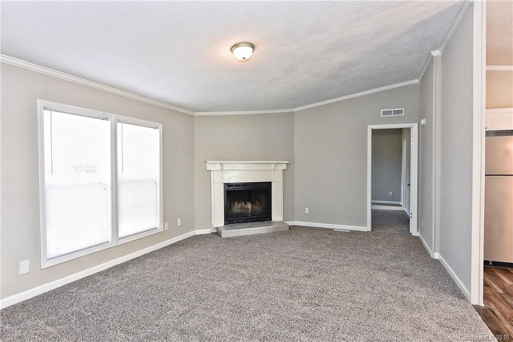 6815 Lackey Road, Unit 1 Vale, NC 28168 - Photo 4 of 24 a view of an empty room with a window