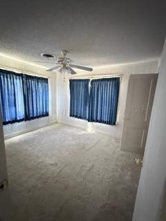 5204 Albert Avenue Amarillo, TX 79106 - Photo 14 of 17 en view of an empty room with a kitchen