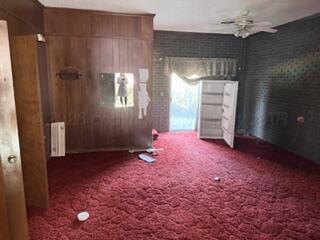 5204 Albert Avenue Amarillo, TX 79106 - Photo 3 of 17 wooden floor and window in an empty room