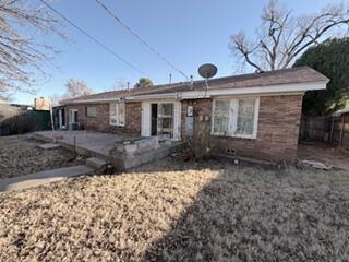 5204 Albert Avenue Amarillo, TX 79106 - Photo 10 of 17 a front view of a house with a yard