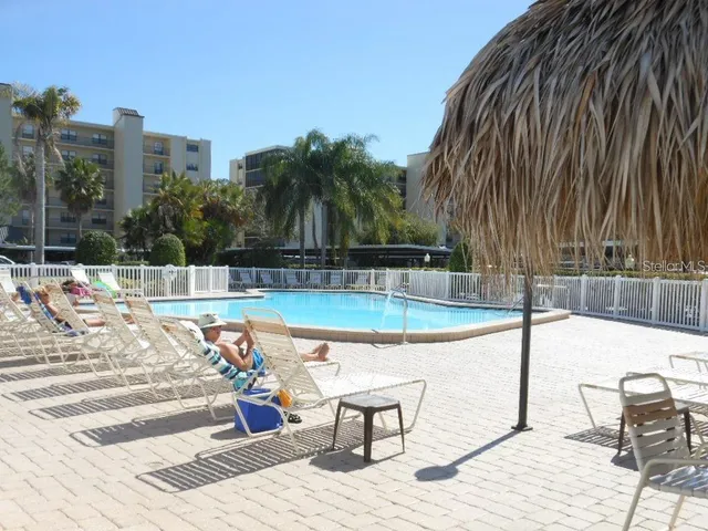 a view of grassy field with mountain