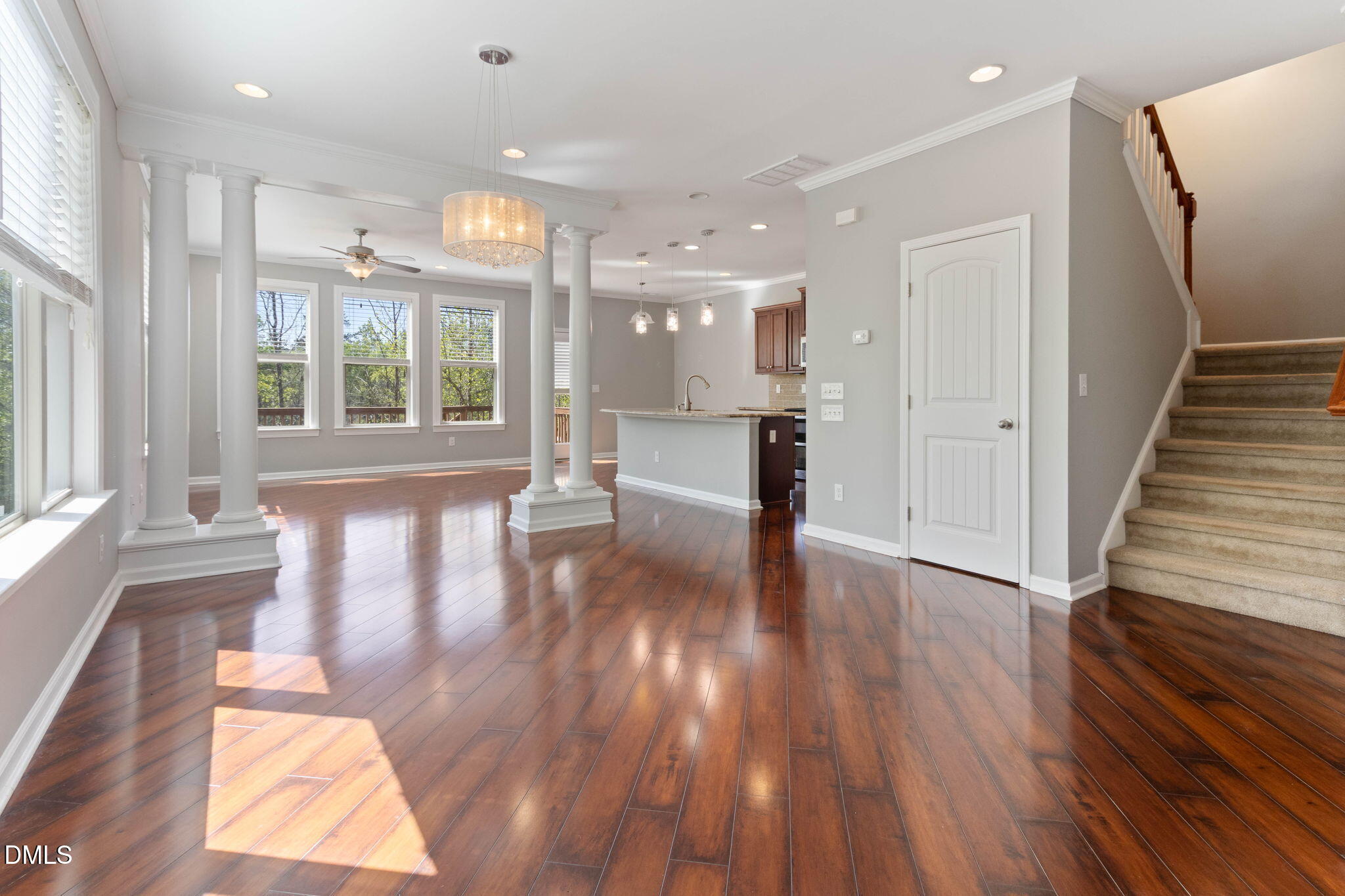 14303 Foxcroft Road Raleigh, NC 27614 - Photo 10 of 70 a view of a hallway with wooden floor and windows