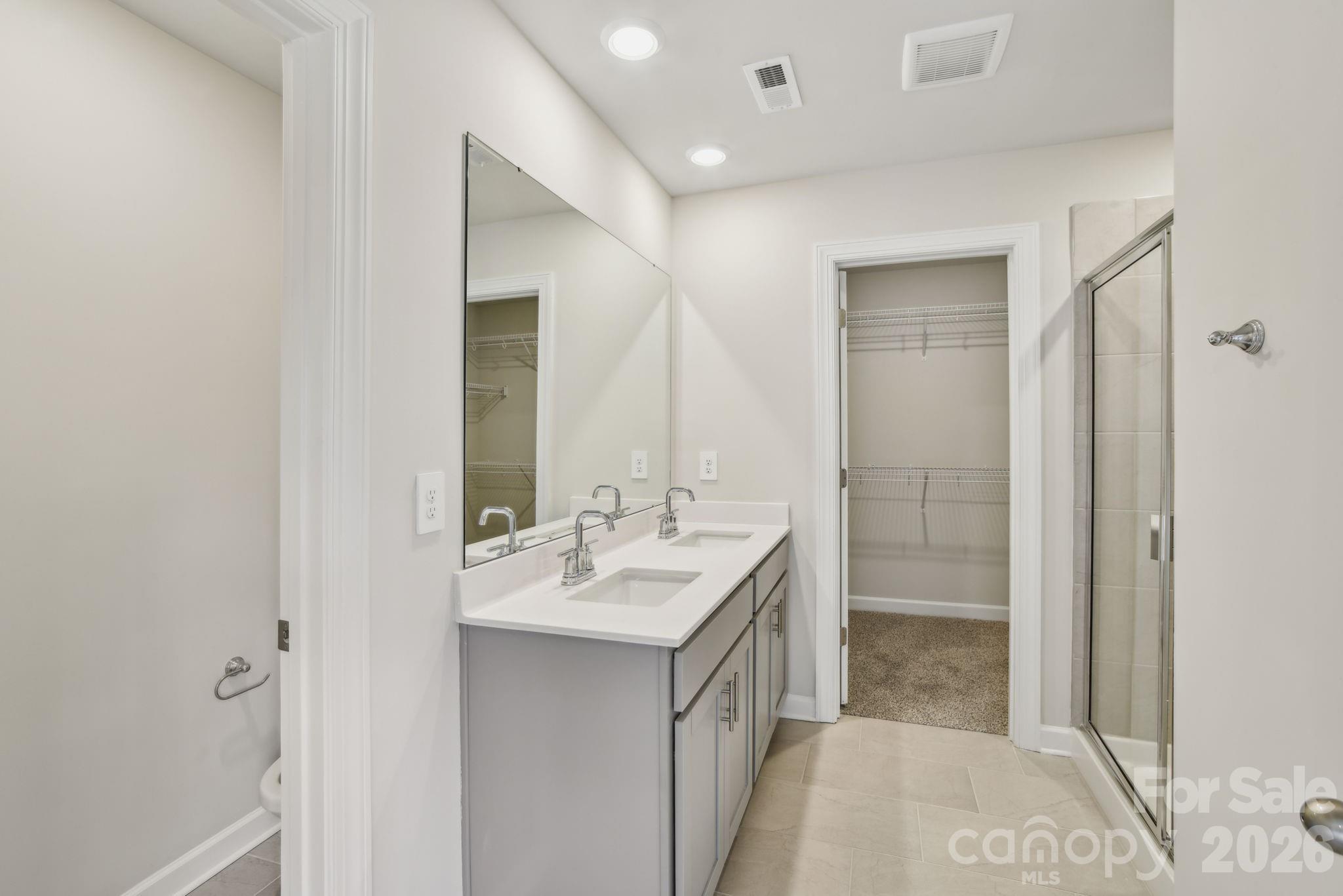 1346 30th St Lane Northeast Conover, NC 28613 - Photo 5 of 13 a bathroom with a sink and a mirror