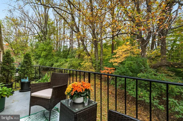 a view of a two chairs in the roof deck