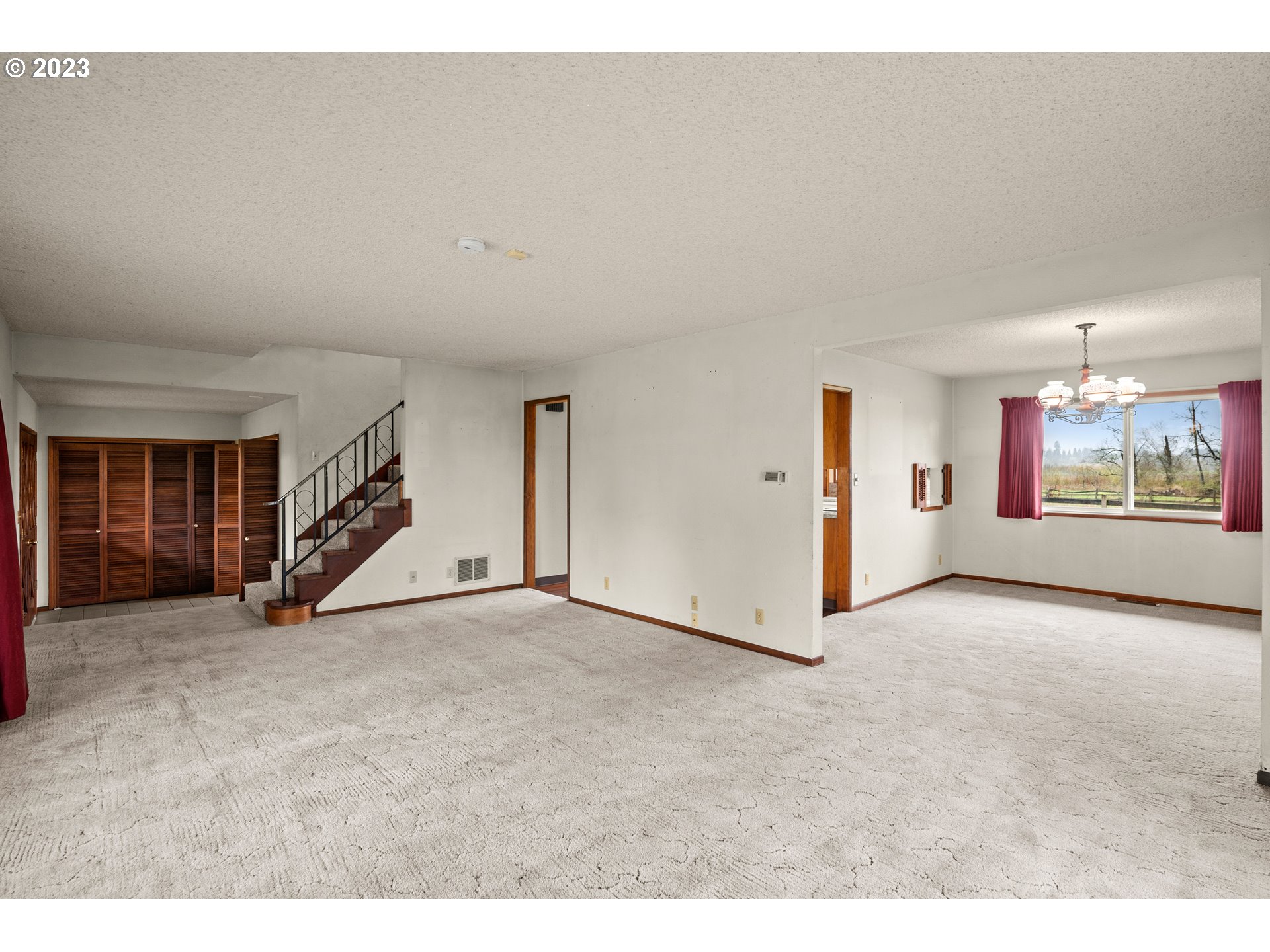 1934 Southwest Stringtown Road Forest Grove, OR 97116 - Photo 12 of 29 a view of a livingroom with an empty space and a window
