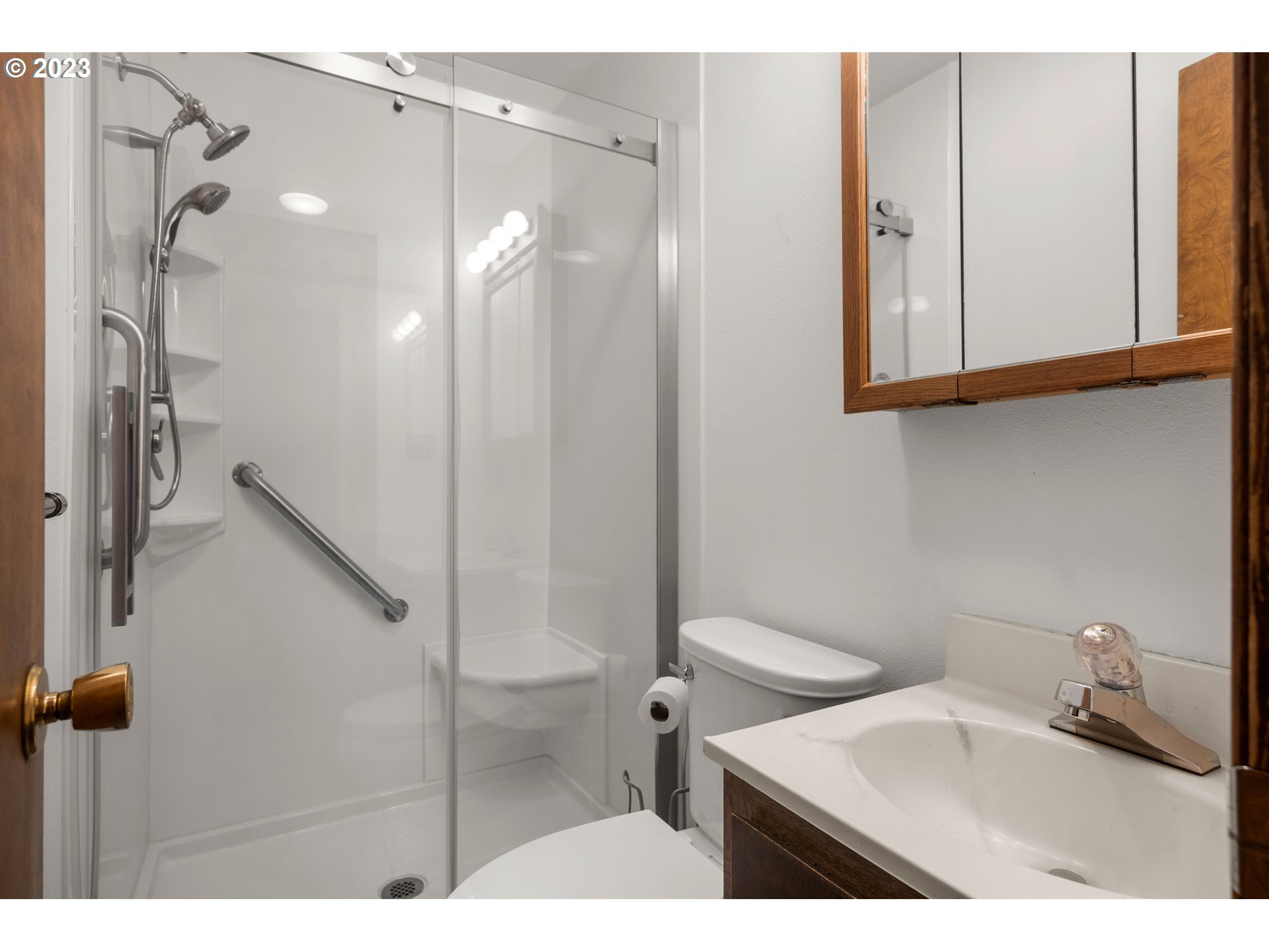 1934 Southwest Stringtown Road Forest Grove, OR 97116 - Photo 15 of 29 a bathroom with a sink a toilet and shower