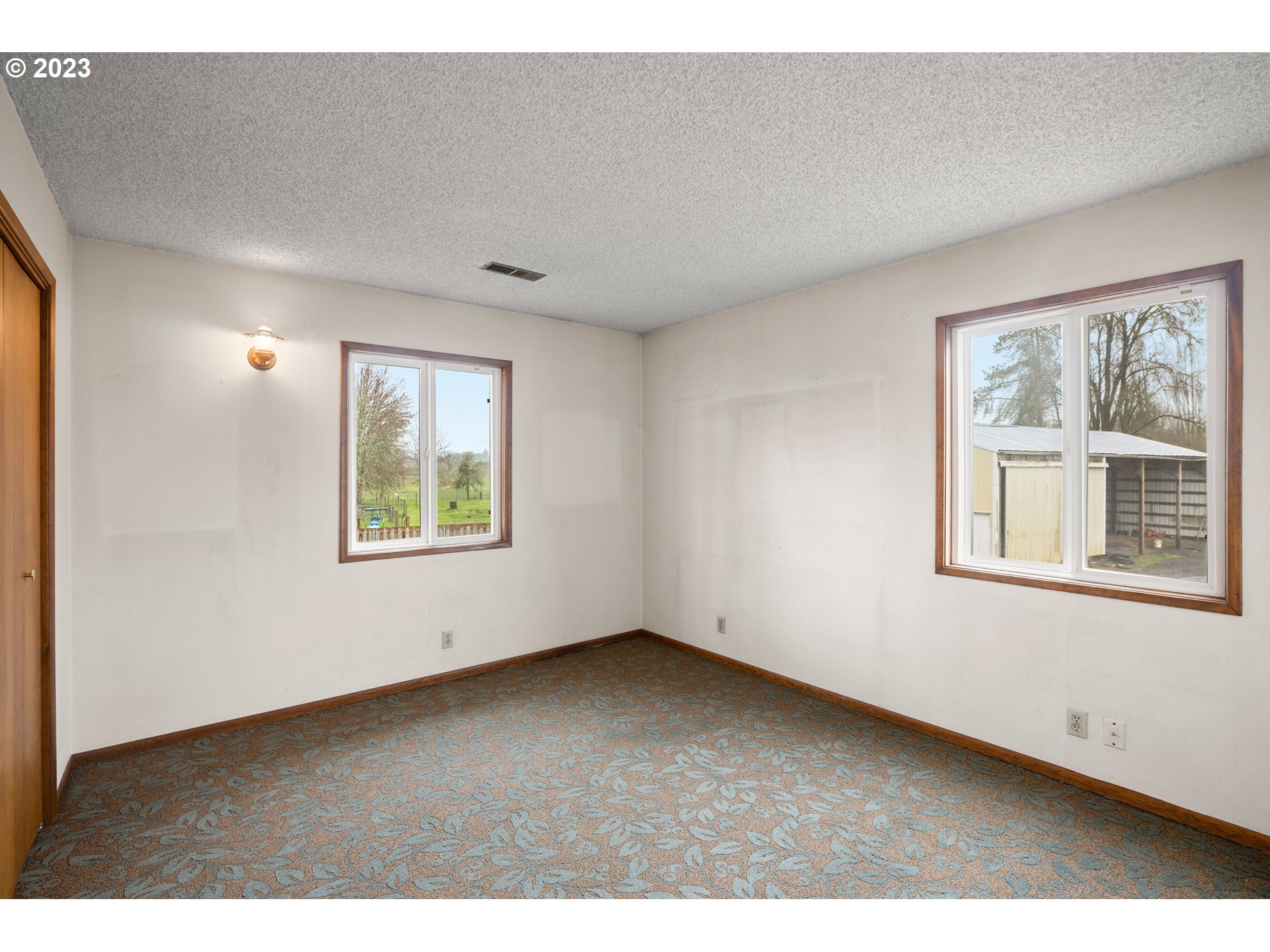 1934 Southwest Stringtown Road Forest Grove, OR 97116 - Photo 23 of 29 an empty room with windows