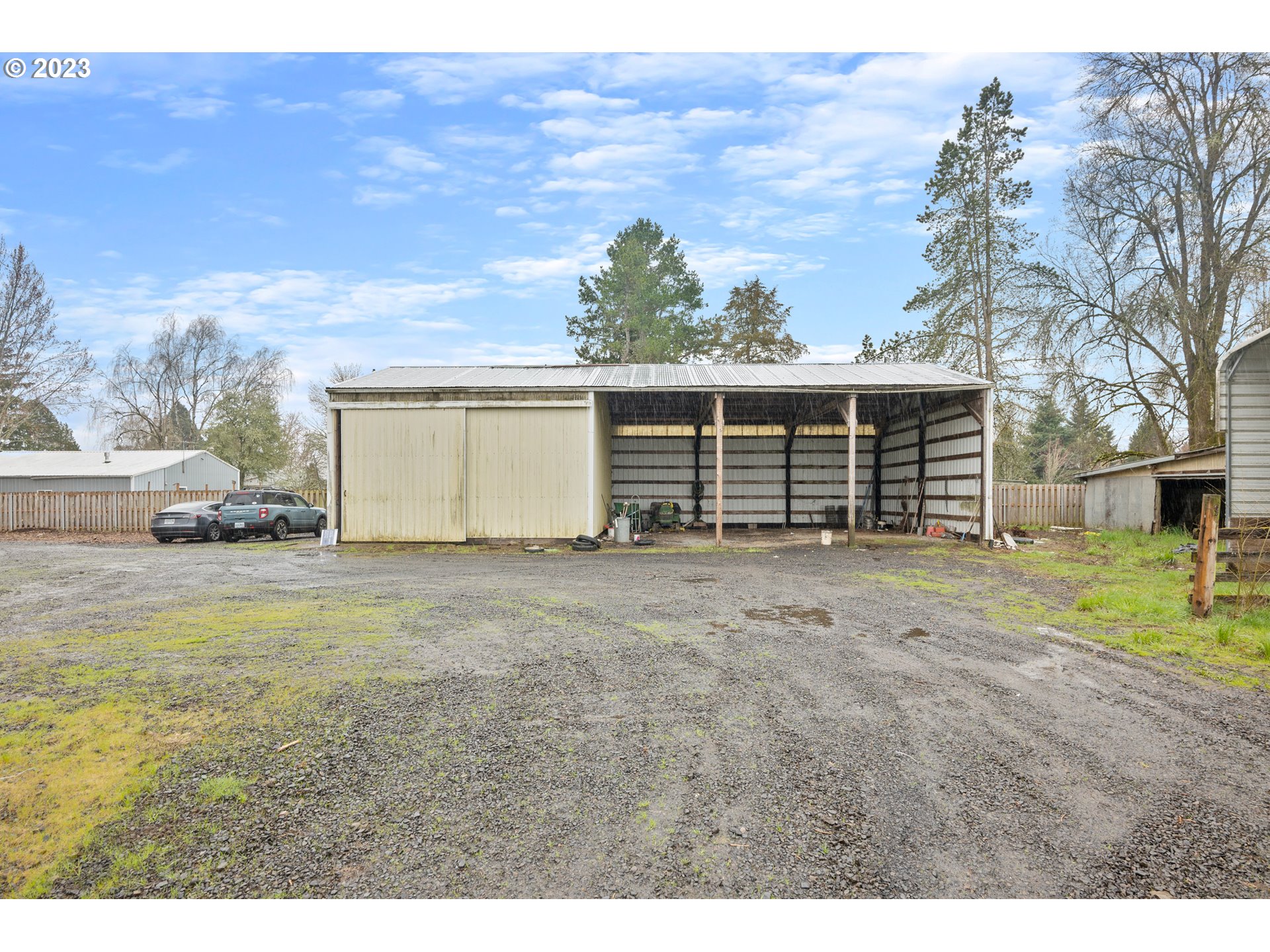 1934 Southwest Stringtown Road Forest Grove, OR 97116 - Photo 28 of 29 a view of a house with a backyard and a garden