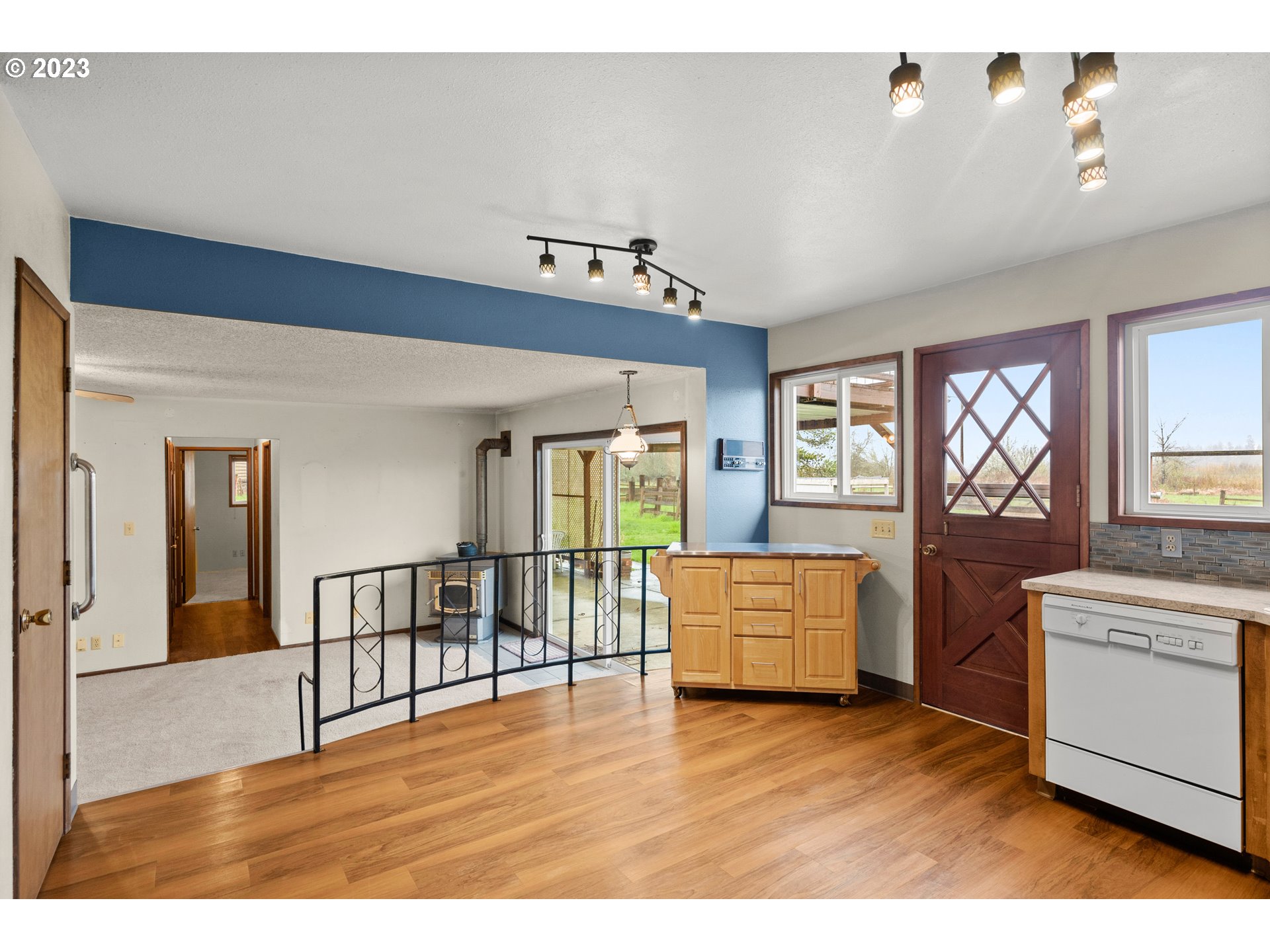 1934 Southwest Stringtown Road Forest Grove, OR 97116 - Photo 8 of 29 a living room with furniture and a wooden floor