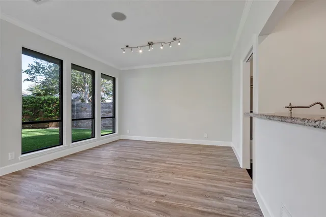 a kitchen with a stove and a refrigerator
