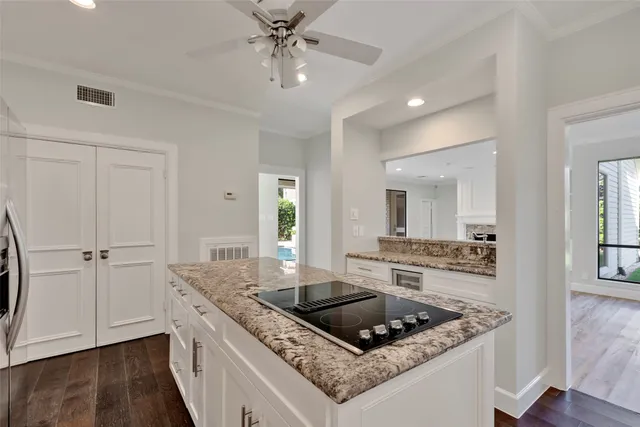a view of a balcony with chairs