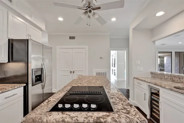 a view of a sink and chair in the backyard