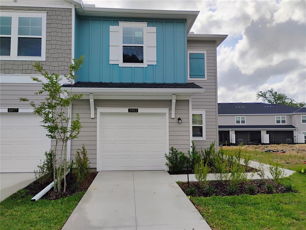 a house view with a garden space