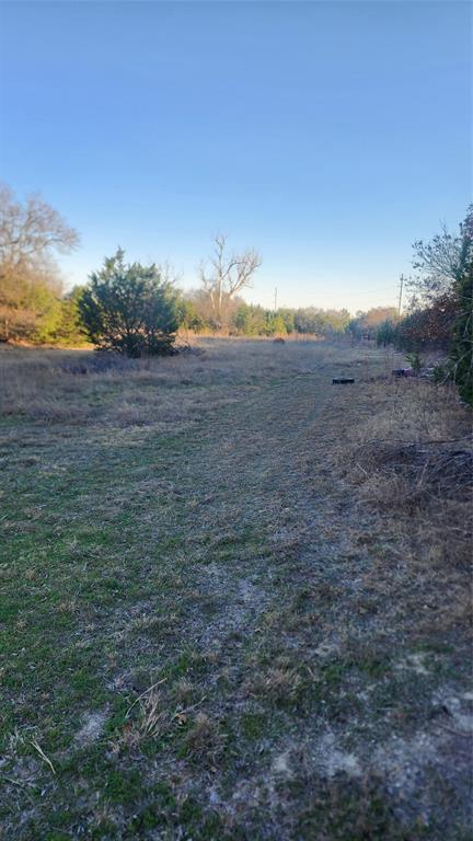 905 Zion Hill Road, Unit B Weatherford, TX 76088 - Photo 14 of 23 a view of a field with an ocean