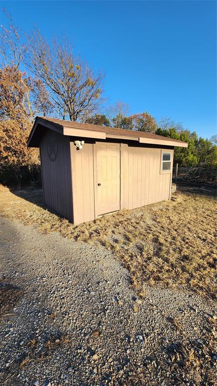 905 Zion Hill Road, Unit B Weatherford, TX 76088 - Photo 16 of 23 a house with a outdoor space