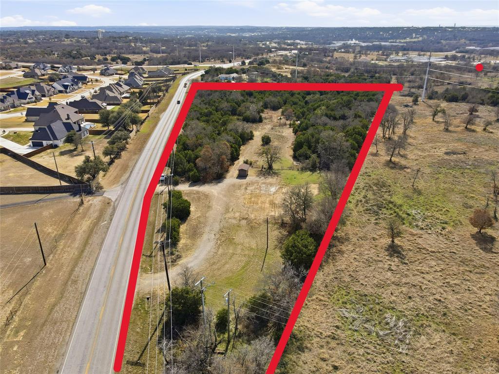 905 Zion Hill Road, Unit B Weatherford, TX 76088 - Photo 4 of 23 a view of a balcony with a road