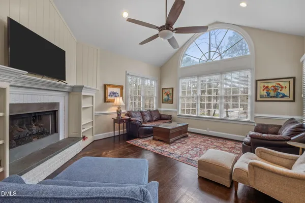 a bathroom with a sink vanity granite and a mirror