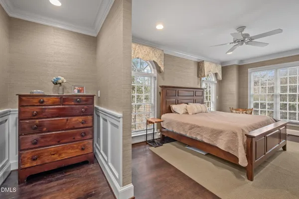 a work room with furniture piano and a rug