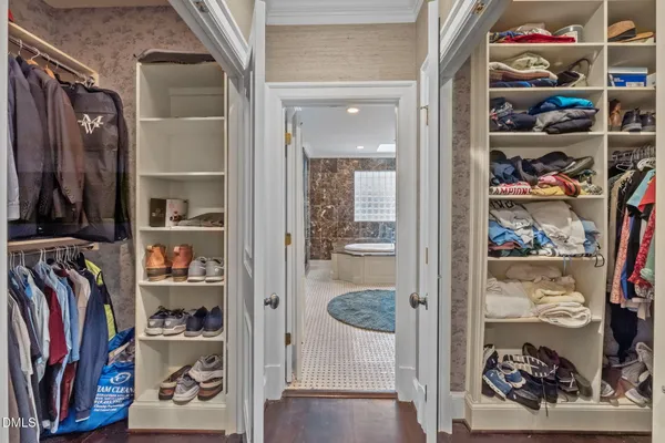 a bed room with a bed and a window