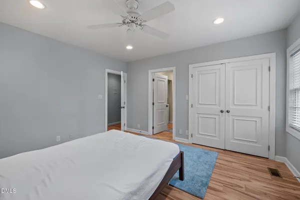 a view of a patio with couches and a fire pit