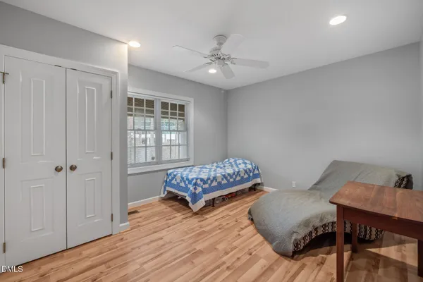 a view of a tree in a yard