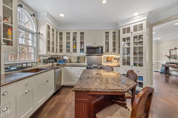 a view of a hallway with washer and dryer