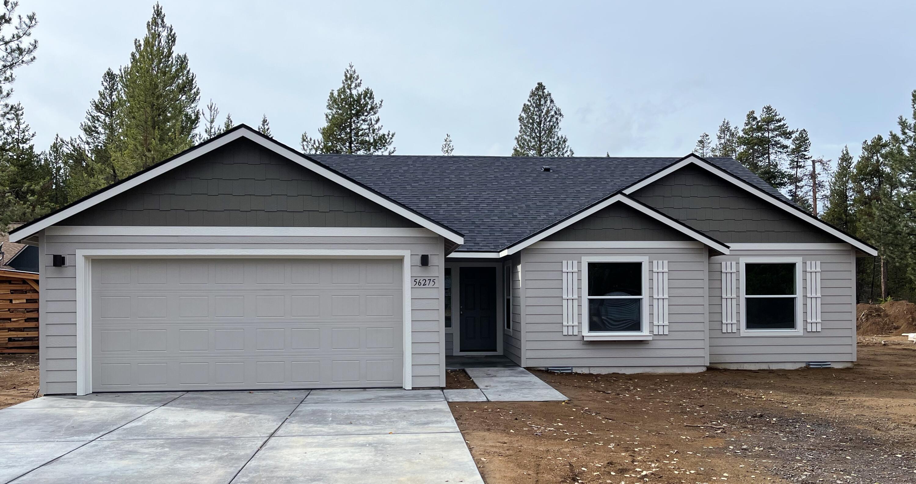 56275 Black Duck Road Bend, OR 97707 - Photo 1 of 15 a view of a house with a yard