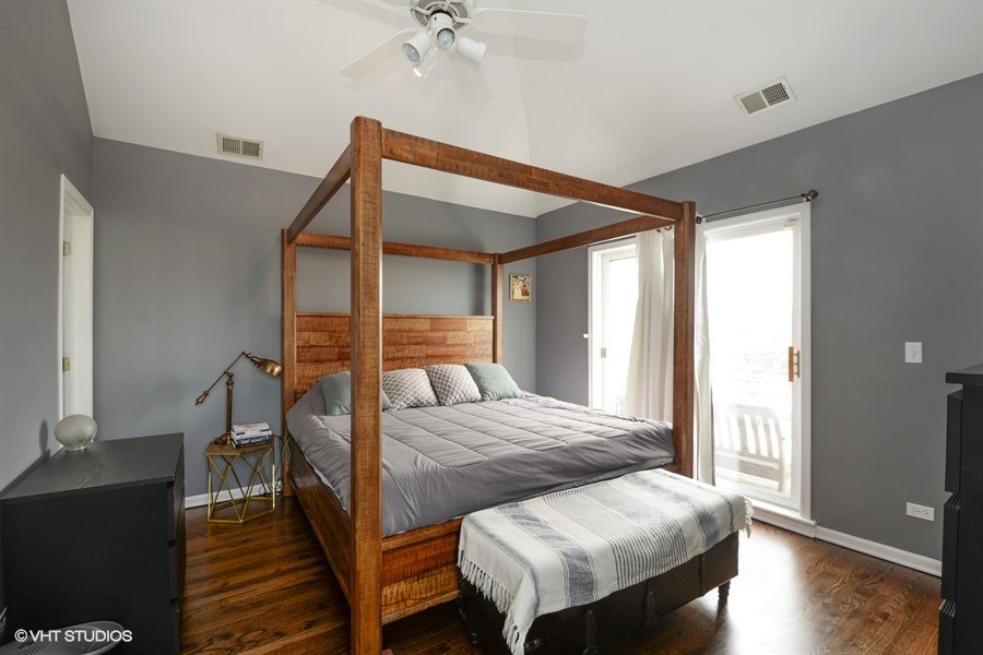 2508 West Division Street, Unit 3 Chicago, IL 60622 - Photo 6 of 10 a bedroom with furniture and wooden floor