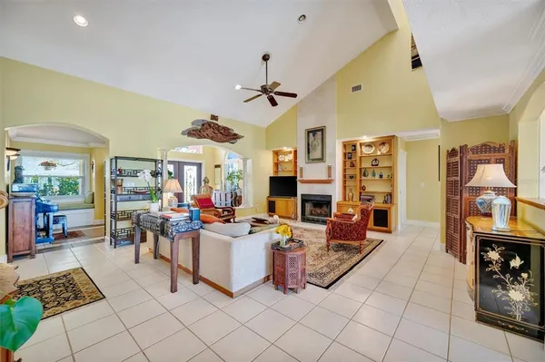 a kitchen with granite countertop a center island and stainless steel appliances