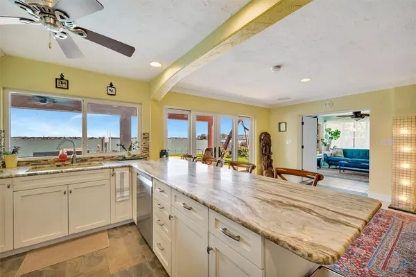 a bedroom with a bed and a flat screen television