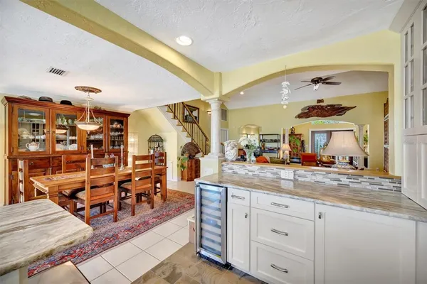 a bathroom with a bathtub and a window