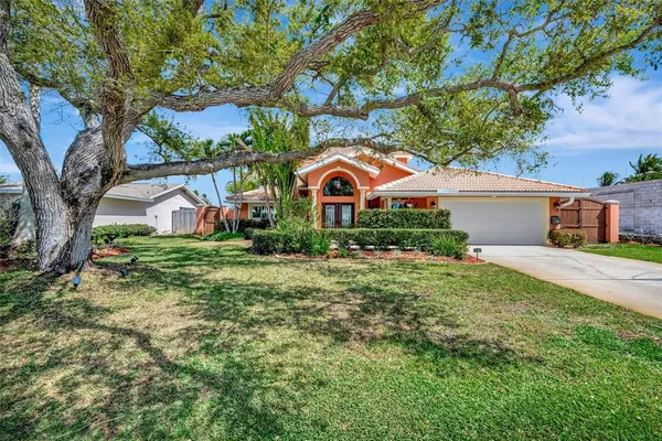 a living room with fireplace furniture and a flat screen tv