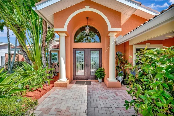 a living room with fireplace furniture and a fireplace