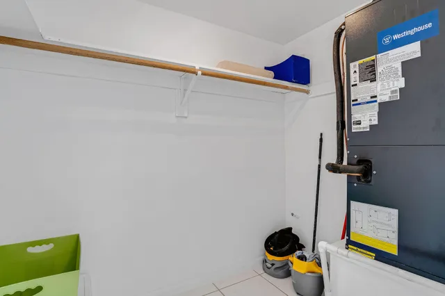 a bathroom with a sink a mirror and a shower