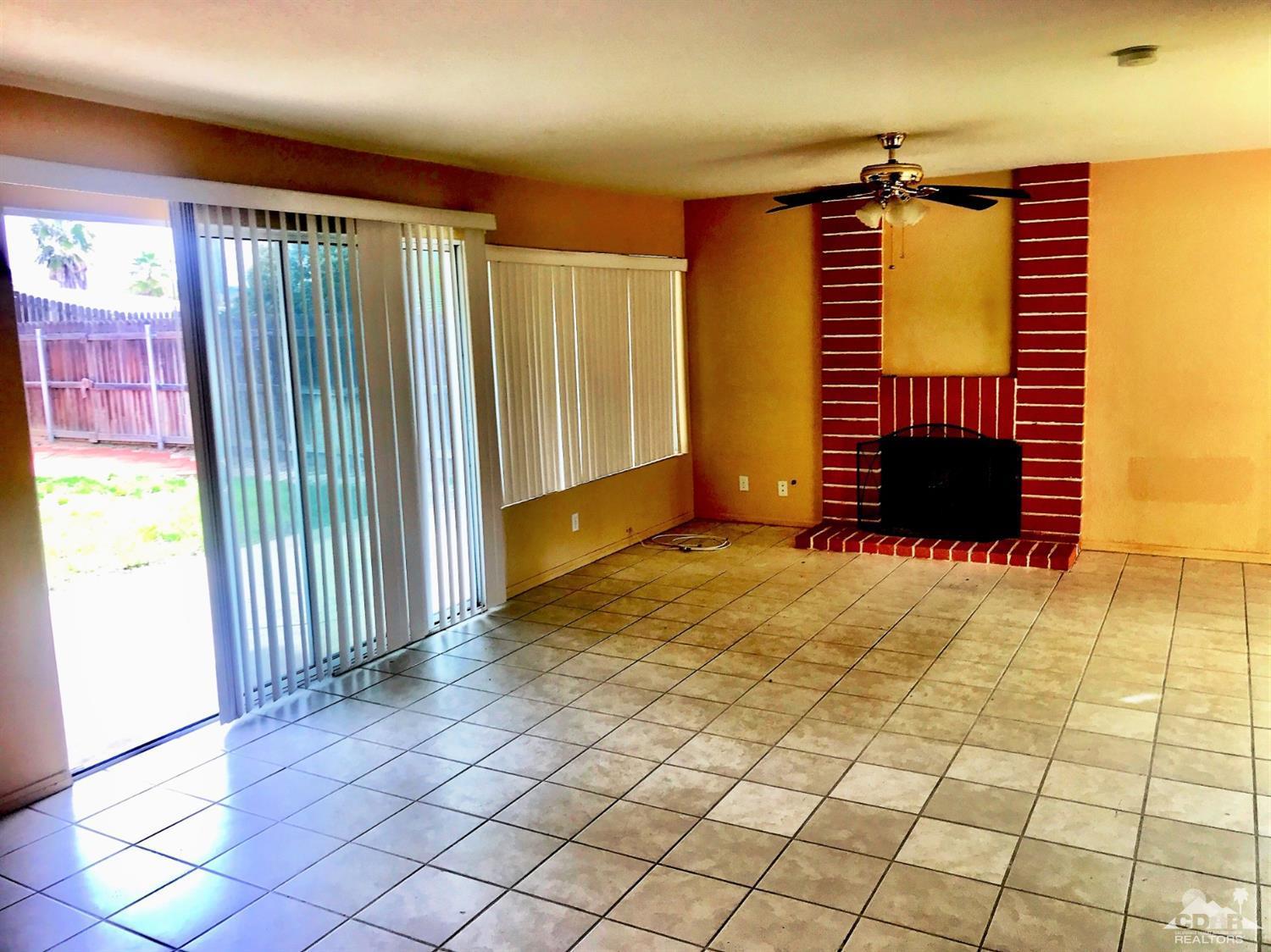 23680 Blooming Meadow Road Moreno Valley, CA 92557 - Photo 17 of 22 a view of a room with window