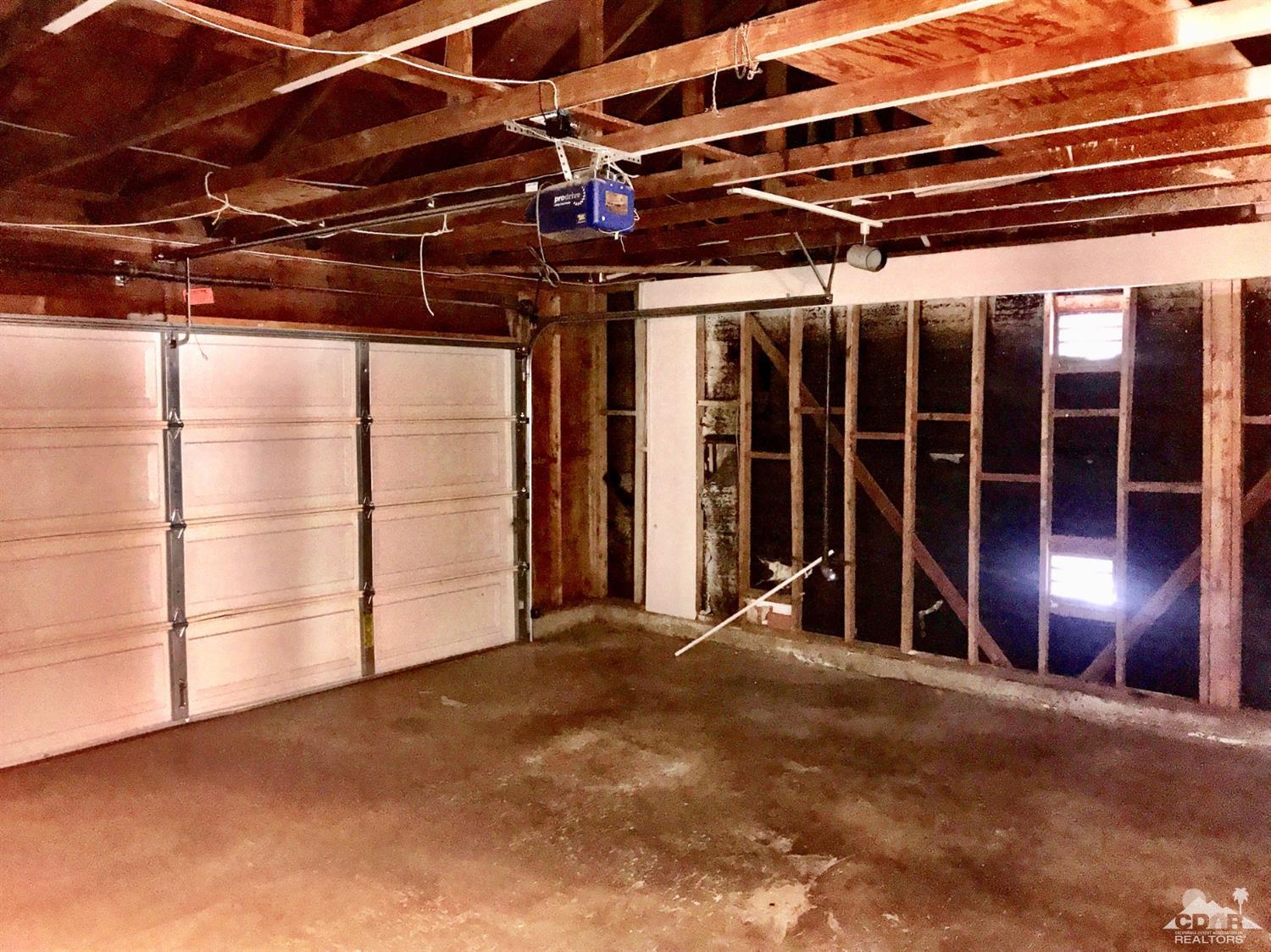 23680 Blooming Meadow Road Moreno Valley, CA 92557 - Photo 18 of 22 a view of a room with wooden walls