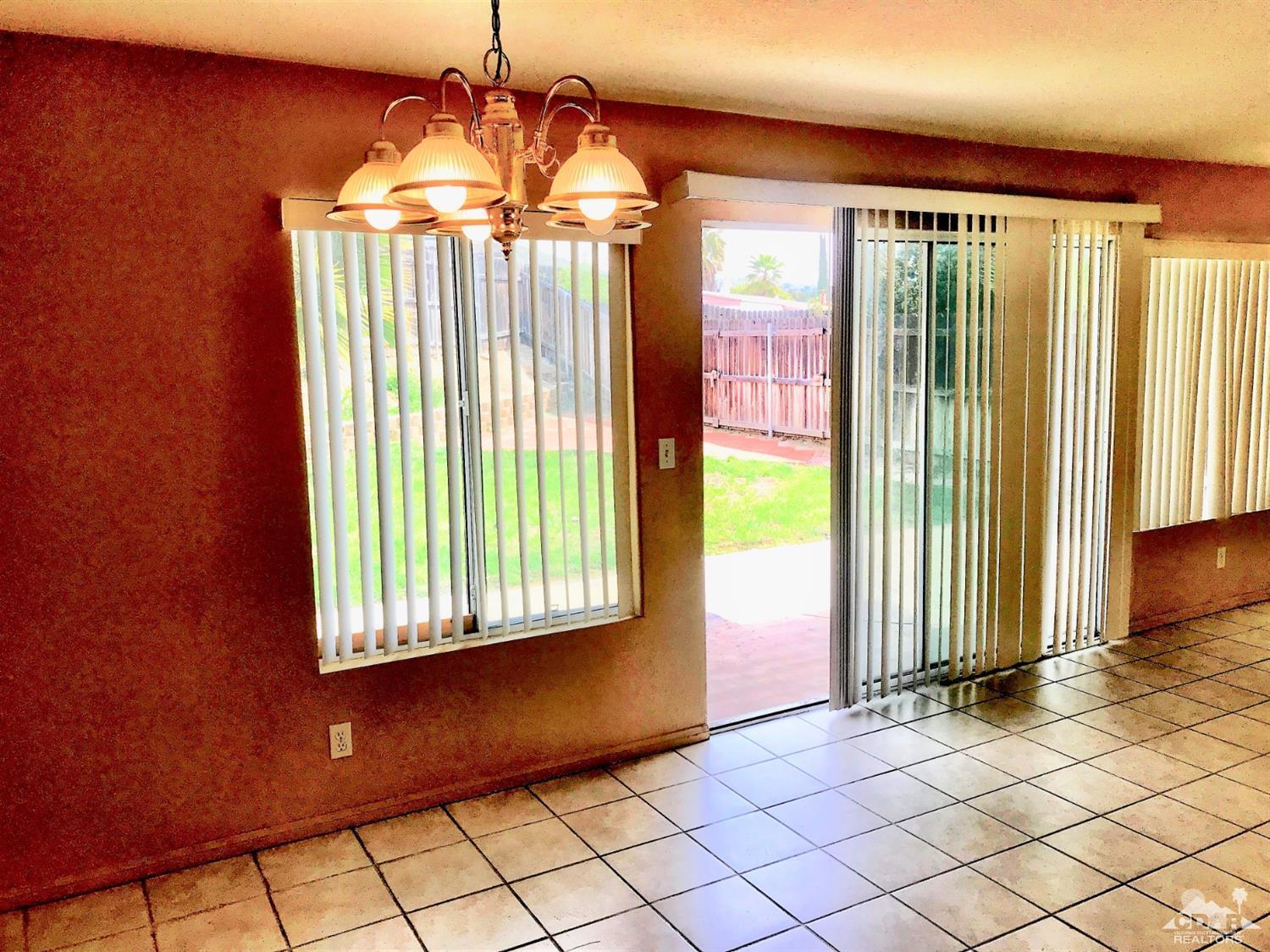 23680 Blooming Meadow Road Moreno Valley, CA 92557 - Photo 22 of 22 a view of a room with windows